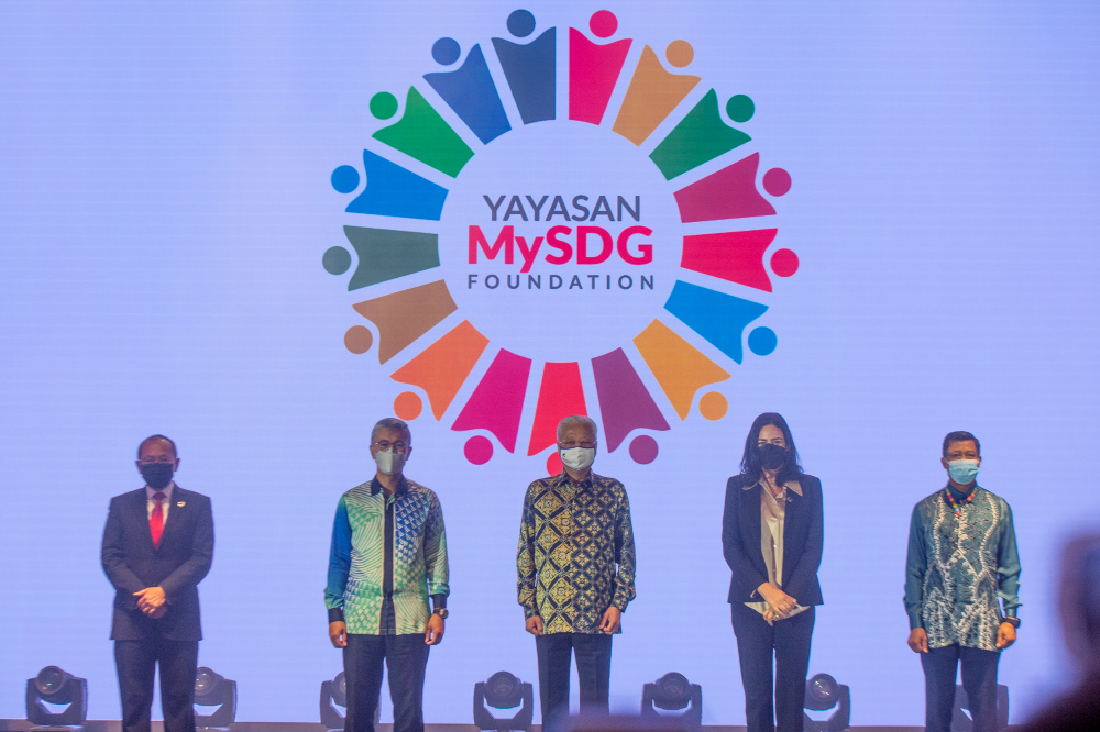 Prime Minister Datuk Seri Ismail Sabri officiates at the launch of the Malaysia Sustainable Development Goals Foundation in Putrajaya, January 27, 2022. Also present is Finance Minister Datuk Seri Tengku Zafrul Abdul Aziz. u00e2u20acu201d Picture by Shafwan Zaidon