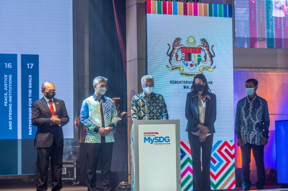Prime Minister Datuk Seri Ismail Sabri officiates at the launch of the Malaysia Sustainable Development Goals Foundation in Putrajaya, January 27, 2022. Also present is Finance Minister Datuk Seri Tengku Zafrul Abdul Aziz. u00e2u20acu201d Picture by Shafwan Zaidon
