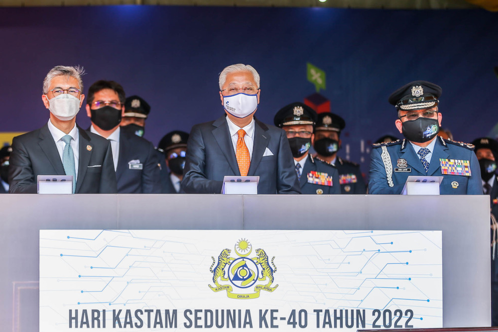 Prime Minister Datuk Seri Ismail Sabri Yaakob with Finance Minister Datuk Seri Tengku Zafrul Abdul Aziz (left) at the 40th World Customs Day Celebration at the Kelana Jaya Customs Complex, January 26, 2022. u00e2u20acu201d Picture by Hari Anggara