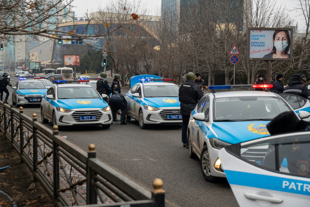 Police officers and their cars block a street in central Almaty January 7, 2022, after violence that erupted following protests over hikes in fuel prices. u00e2u20acu201d AFP pic