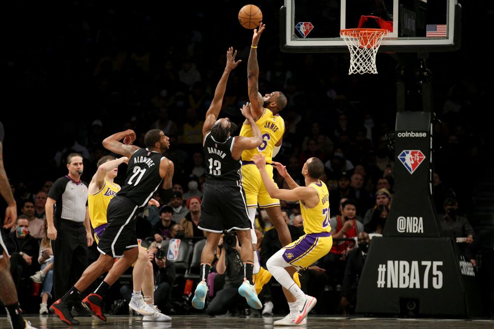 Los Angeles Lakers forward LeBron James (6) attempts to block a shot by Brooklyn Nets guard James Harden (13) during the second quarter at Barclays Centre, Brooklyn January 25, 2022. u00e2u20acu201d Reuters picnn