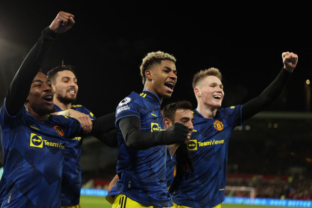 Manchester United's Marcus Rashford celebrates scoring their third goal against Brentford with teammates at the Brentford Community Stadium, London January 19, 2022u00e2u20acu201d Reuters pic