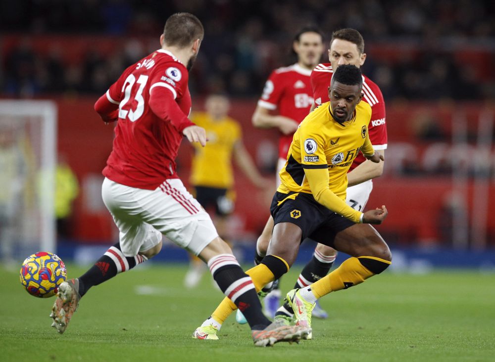 Wolverhampton Wanderers' Nelson Semedo in action with Manchester United's Luke Shaw at Old Trafford, Manchester January 3, 2022. u00e2u20acu201d Reuters pic