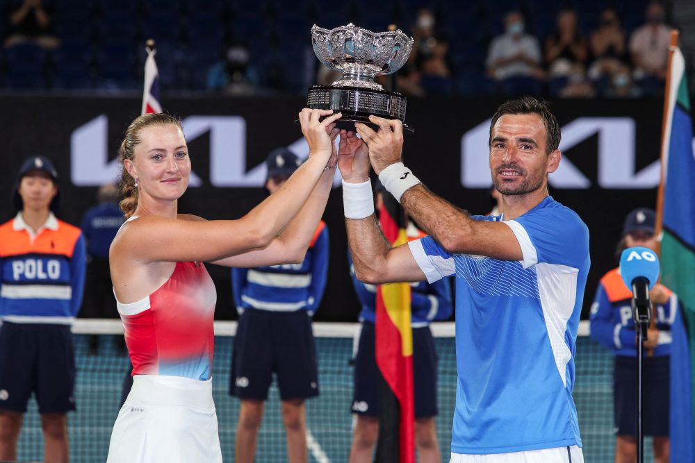 nFrance's Kristina Mladenovic and Croatia's Ivan Dodig pose with the trophy after the mixed doubles final against Australia's Jaimee Fourlis and Jason Kubler in Melbourne January 28, 2022. u00e2u20acu201d AFP picn