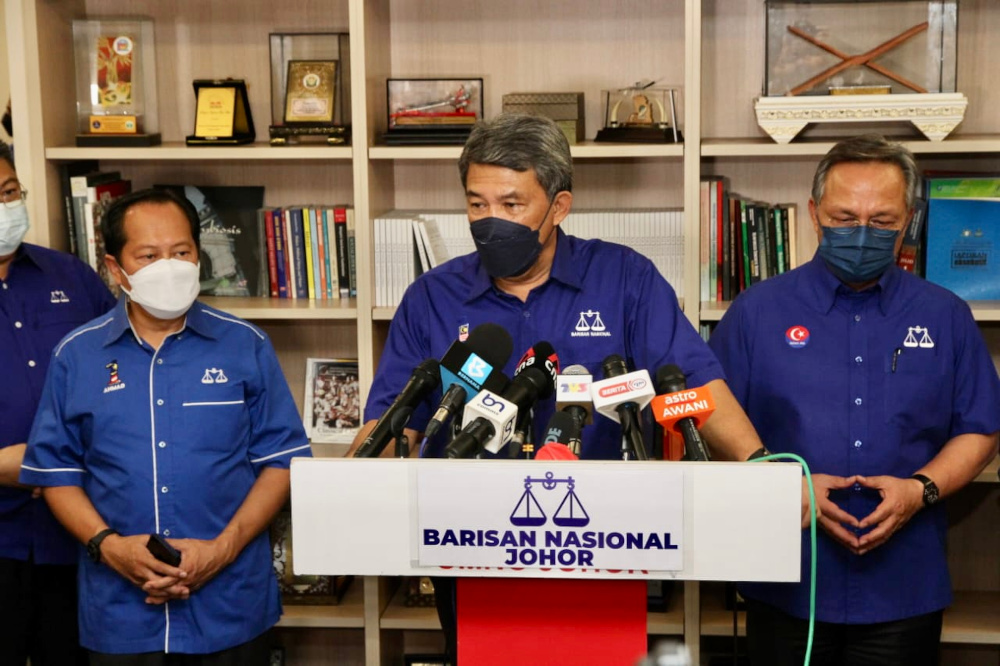 Barisan Nasional (BN) deputy chairman Datuk Seri Mohamad Hasan (centre) said the close working relationship among Umno, MCA and MIC is the main driving force behind the coalition. u00e2u20acu201d Picture by Ben Tan