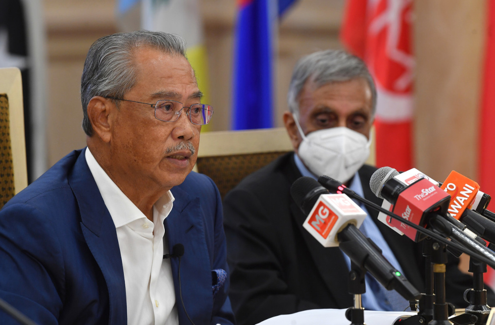 National Recovery Council chairman Tan Sri Muhyiddin Yassin speaks at a media conference after chairing the NRC meeting in Putrajaya, January 10, 2022. u00e2u20acu201d Bernama pic 