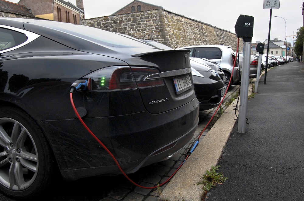 Cars are seen charging in free parking spaces for electric cars in central Oslo. u00e2u20acu2022 AFP pic