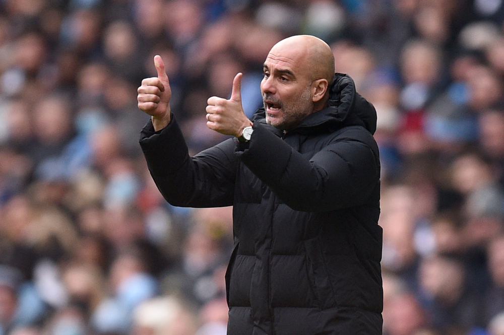Manchester City manager Pep Guardiola gestures during the English Premier League football match against Chelsea at the Etihad Stadium in Manchester, north-west England, January 15, 2022. u00e2u20acu201d AFP pic 