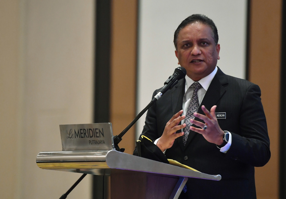 Housing and Local Government Minister Datuk Seri Reezal Merican Naina Merican speaks during the presentation ceremony of appointment letters to 25 PoE members in Putrajaya, January 12, 2022. u00e2u20acu201d Bernama pic 