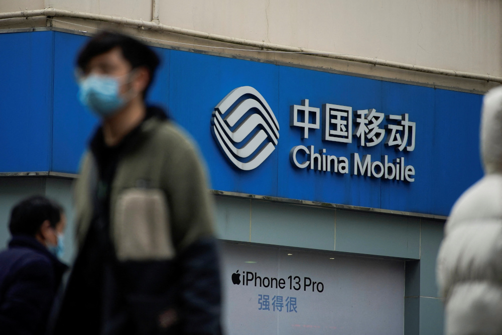 A sign of China Mobile is seen on a street in Shanghai January 4, 2022. u00e2u20acu201d Reuters pic