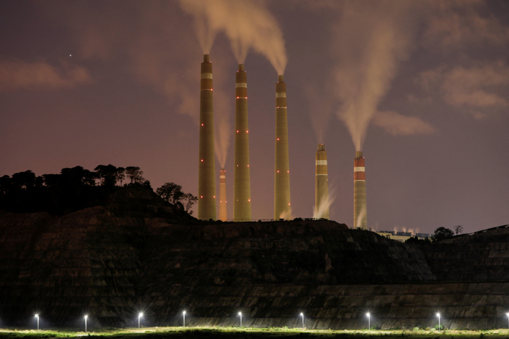 Smoke and steam billows from the coal-fired power plant owned by Indonesia Power, next to an area for Java 9 and 10 Coal-Fired Steam Power Plant Project in Suralaya, Banten province July 11, 2020. u00e2u20acu201d Reuters pic