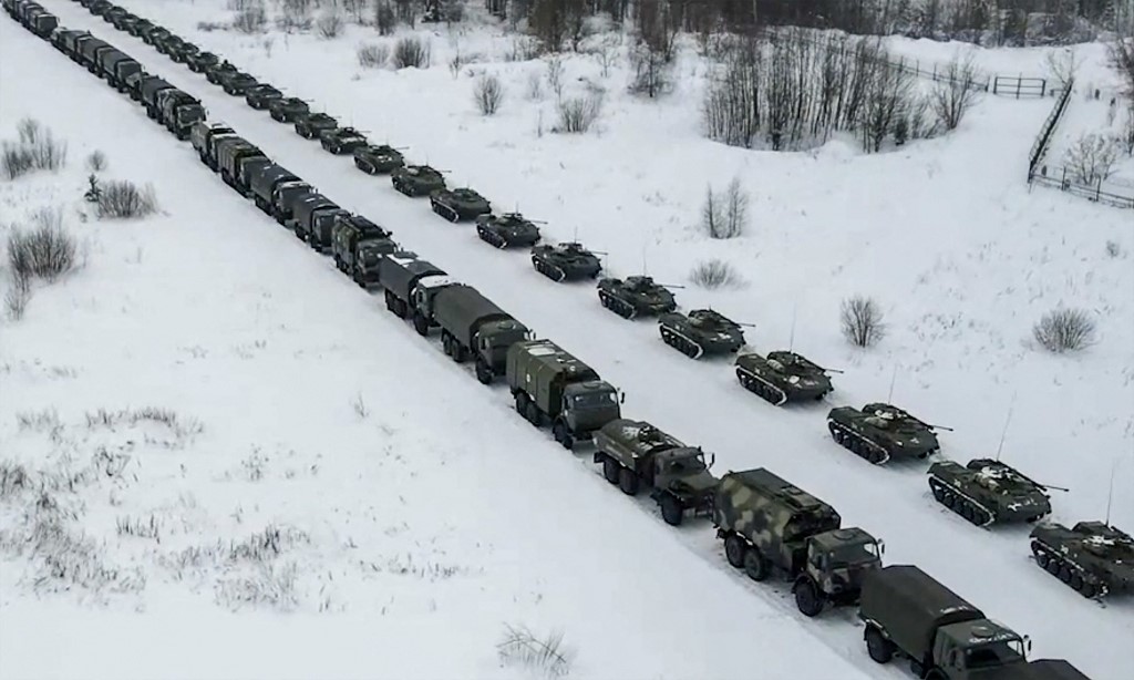 This handout image grab taken on January 6, 2022 and released by the Russian Defence Ministry, shows an aerial view of Russian military vehicles waiting for loading to a military cargo plane to depart to Kazakhstan at the airport of Ivanovo. u00e2u20acu201d AFP pic
