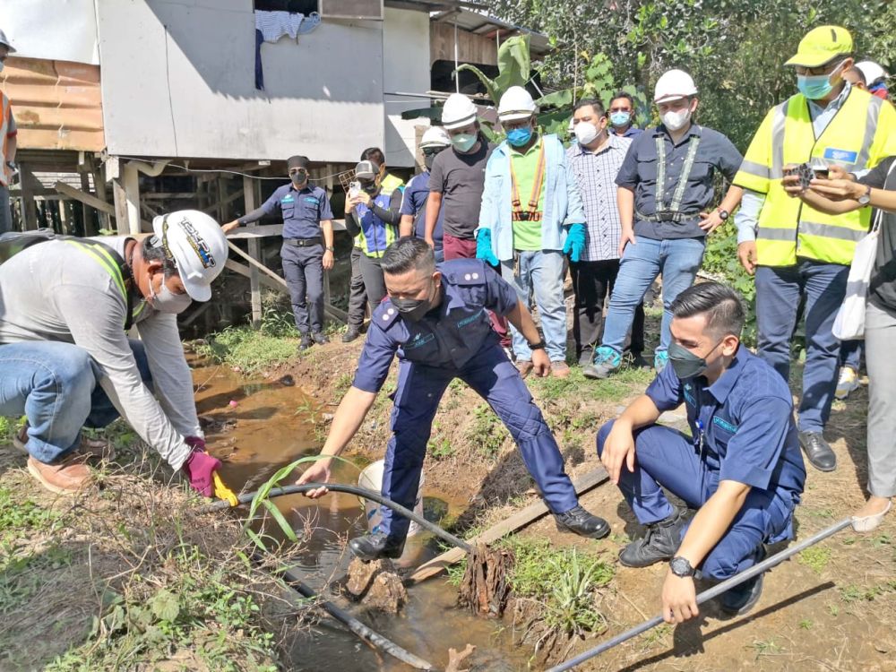 Illegal water connections are pictured at Tobobon Ratau in Menggatal. u00e2u20acu201d Borneo Post pic