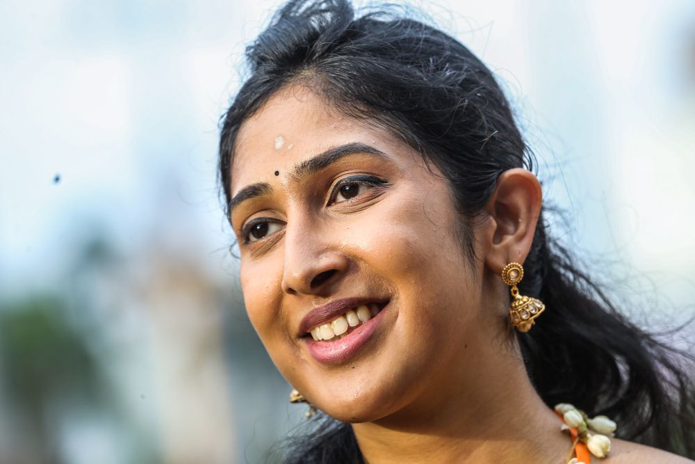 Laveena Jayabarathi, 25, speaks to Malay Mail during an interview at Batu Caves on Thaipusam January 18, 2022. — Picture by Hari Anggara 