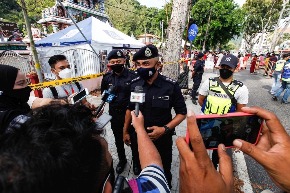 Northeast District Police Chief ACP Soffian Santong speaks to members of the press near the Hilltop Murugan Temple in George Town during Thaipusam January 18, 2022. — Picture by Sayuti Zainudin