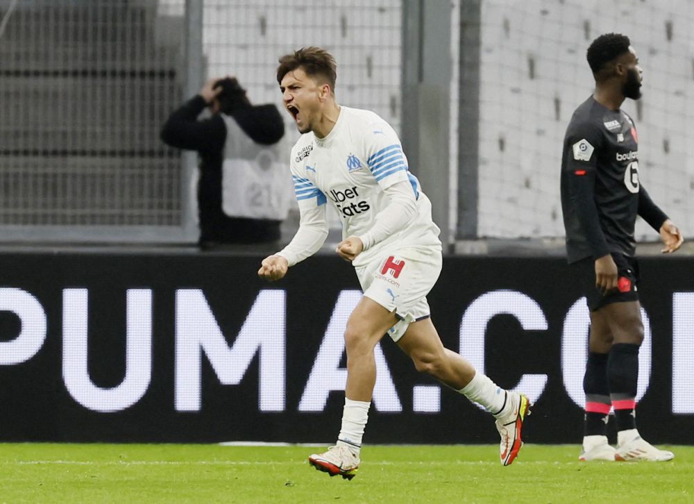 Olympique de Marseille's Cengiz Under celebrates scoring their first goal against Lille at the Orange Velodrome, Marseille January 16, 2022. u00e2u20acu201d Reuters pic