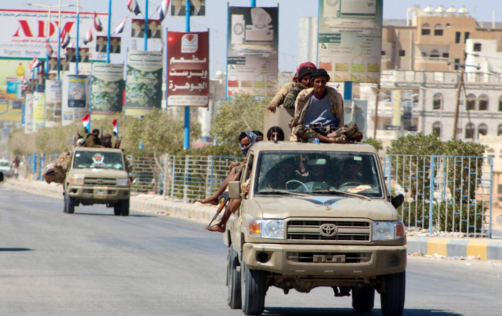 Yemeni pro-government fighters from the UAE-trained Giants Brigade, drive trhough Ataq city, east of the Red Sea port of Aden, on their way to the frontline facing pro-Iran Huthi fighters, January 28, 2022. u00e2u20acu201d AFP picnn