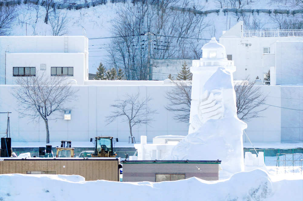 The construction of massive snow structures is in progress.