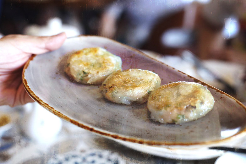'Jiǔcài bǐng' or garlic chive pancakes with dried shrimp.