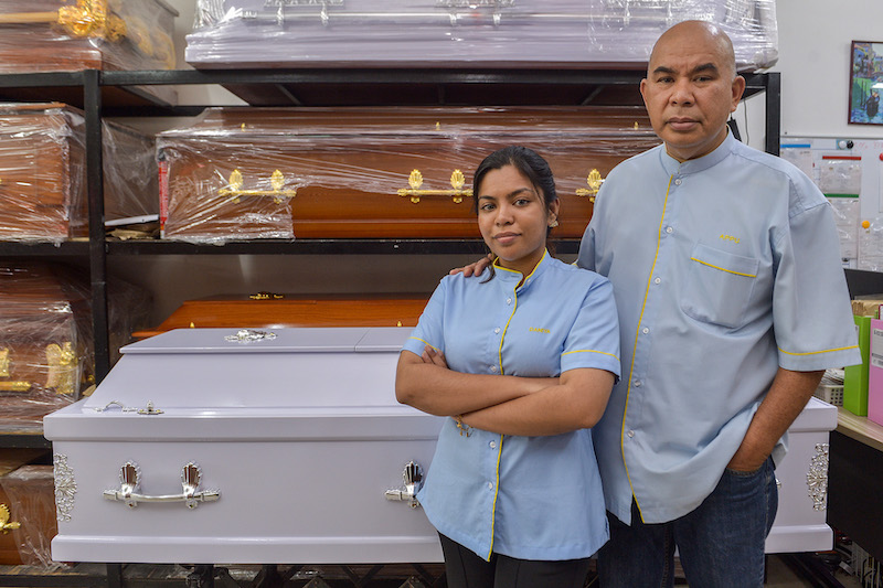 Founder of KL Funeral Services, Parama Sarathy Naidu and his daughter, Managing Director of KL Funeral Services, Daniya Naidu take a photo during an interview at their headquarters on February 3,2022. u00e2u20acu201d Picture by Miera Zulyana