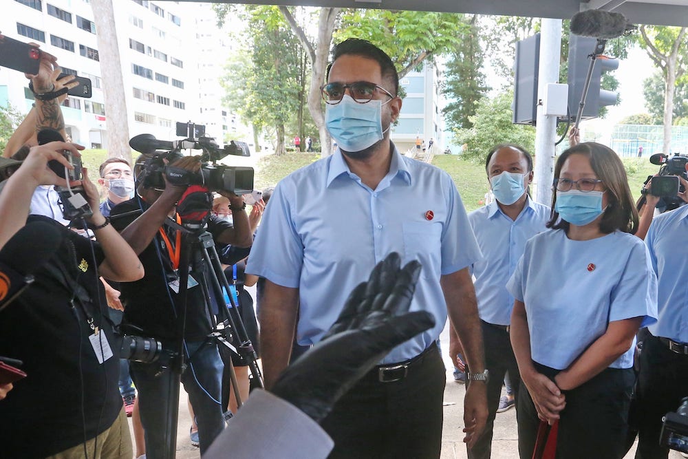 The Committee of Privileges recommended in its report that opposition leader Pritam Singh (centre) and fellow Member of Parliament Faisal Manap (2nd right) be referred to the public prosecutor for further investigation. u00e2u20acu201d TODAY pic
