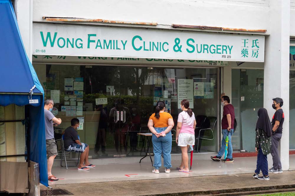 Patients waiting outside a clinic in Singapore February 10, 2022. u00e2u20acu201d TODAY pic
