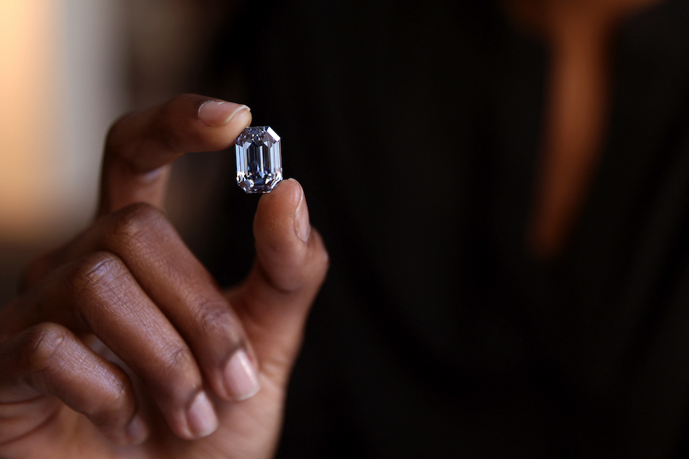 The De Beers Cullinan Blue diamond is shown before being auctioned at Sotheby's on February 15, 2022 in New York City. u00e2u20acu201d Michael Loccisano/Getty Images/AFP pic