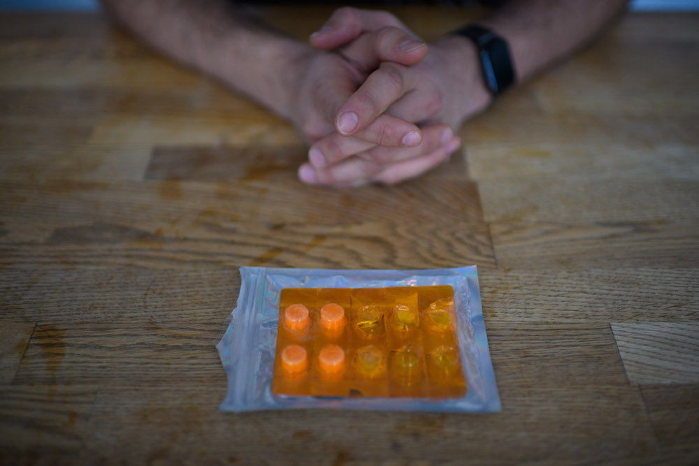 Philip Markle poses for a photo with a ketamine pill pack at his home in the Brooklyn borough of New York January 27, 2022. u00e2u20acu201d AFP pic