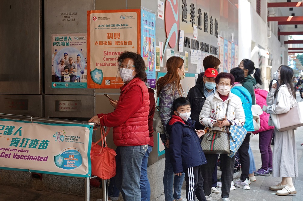 People wearing face masks line up outside a vaccination centre to get a dose of the coronavirus disease vaccine in Hong Kong February 15, 2022. u00e2u20acu201d Reuters pic