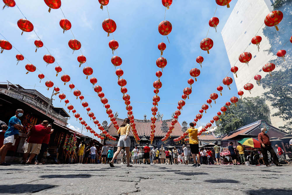 Devotees visit the Goddess of Mercy Temple to offer their prayer during Chinese New Year celebration at Jalan Kapitan Keling, Penang February 1, 2022. u00e2u20acu201d Picture by Sayuti Zainudin