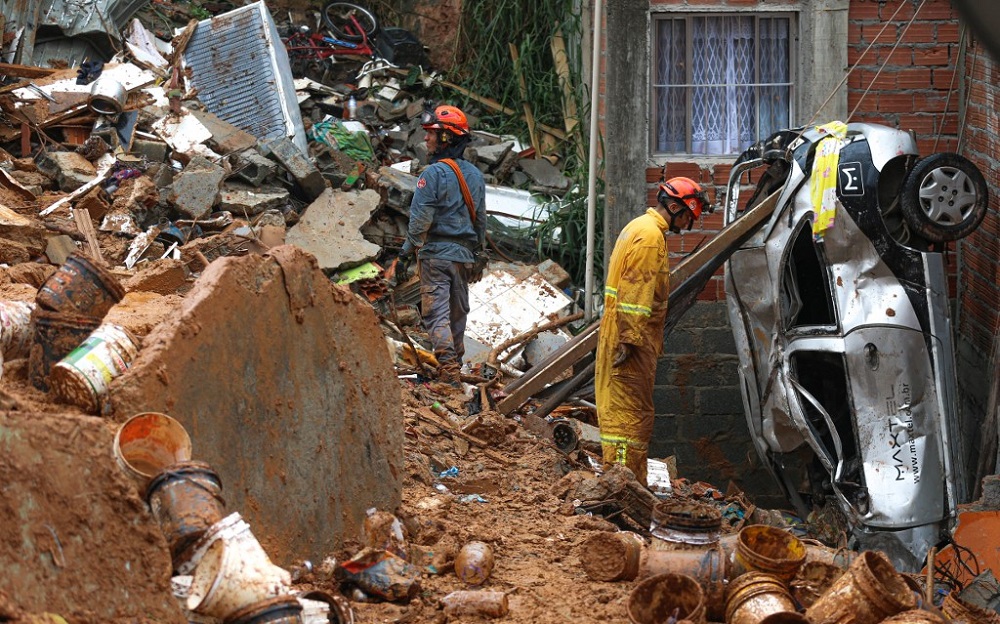 Firefighters remove mud in search of victims after a landslide caused by heavy rains buried homes in Franco da Rocha, Sao Paulo January 31, 2022. u00e2u20acu201d AFP pic