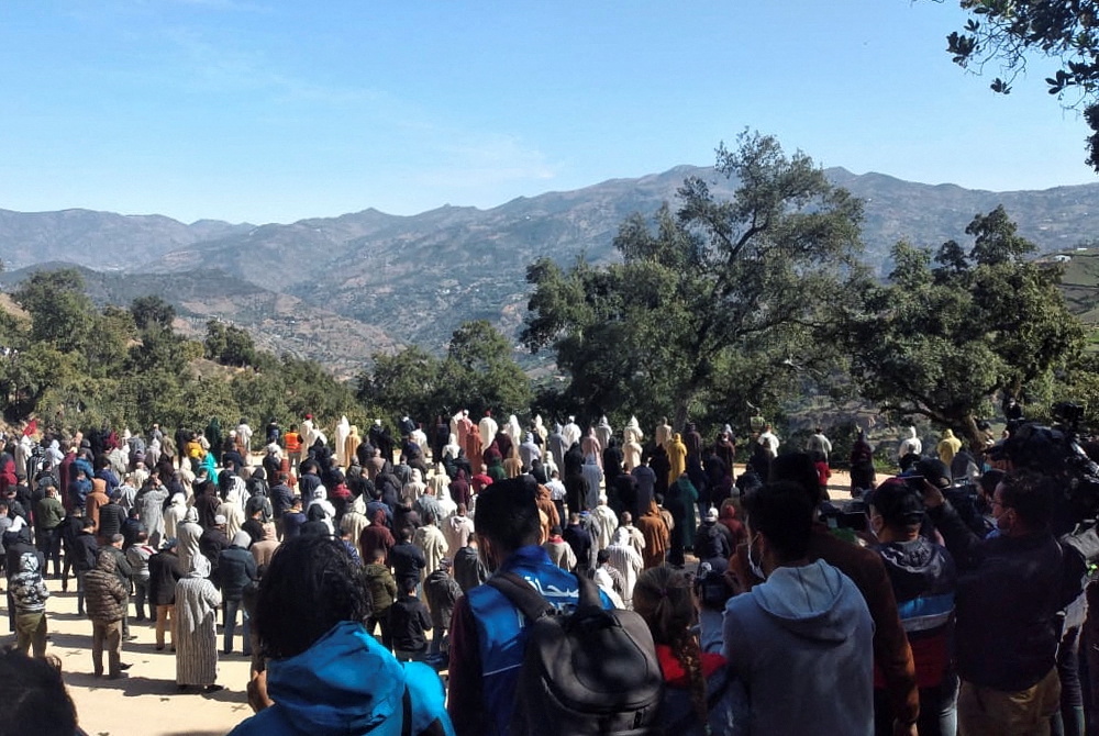 Mourners gather during the funeral of 5-year-old child, Rayan Awram, who died after being trapped in a well, near Chefchaouen, Morocco February 7, 2022. u00e2u20acu201d Reuters pic