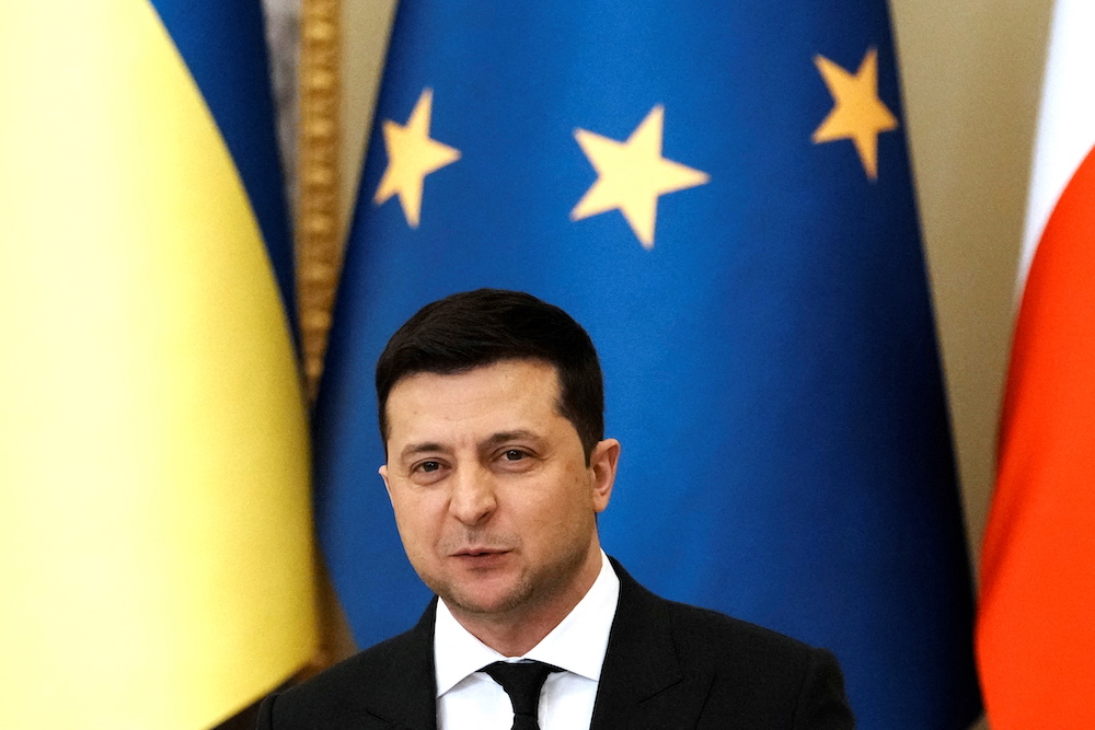 Ukrainian President Volodymyr Zelensky speaks during a joint news conference with French President Emmanuel Macron(not seen) in Kyiv, Ukraine February 8, 2022. u00e2u20acu201d Pool via Reuters pic