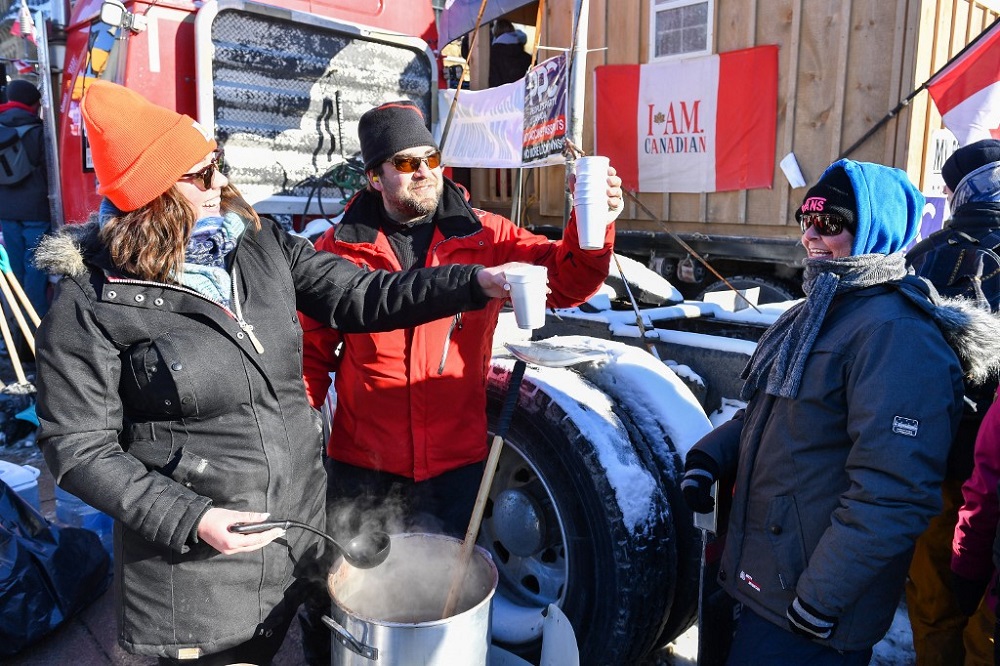Supporters offer free soup to everyone attending the 'Freedom Convoy' in Ottawa February 5, 2022. u00e2u20acu201d AFP pic