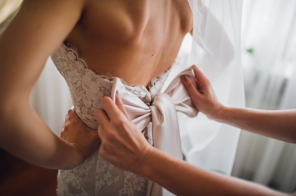 Accessories and wedding dresses with bows are a key trend in 2022, a year punctuated by the more intimate and personal micro wedding.  u00e2u20acu201d Shutterstock pic via ETX Studio