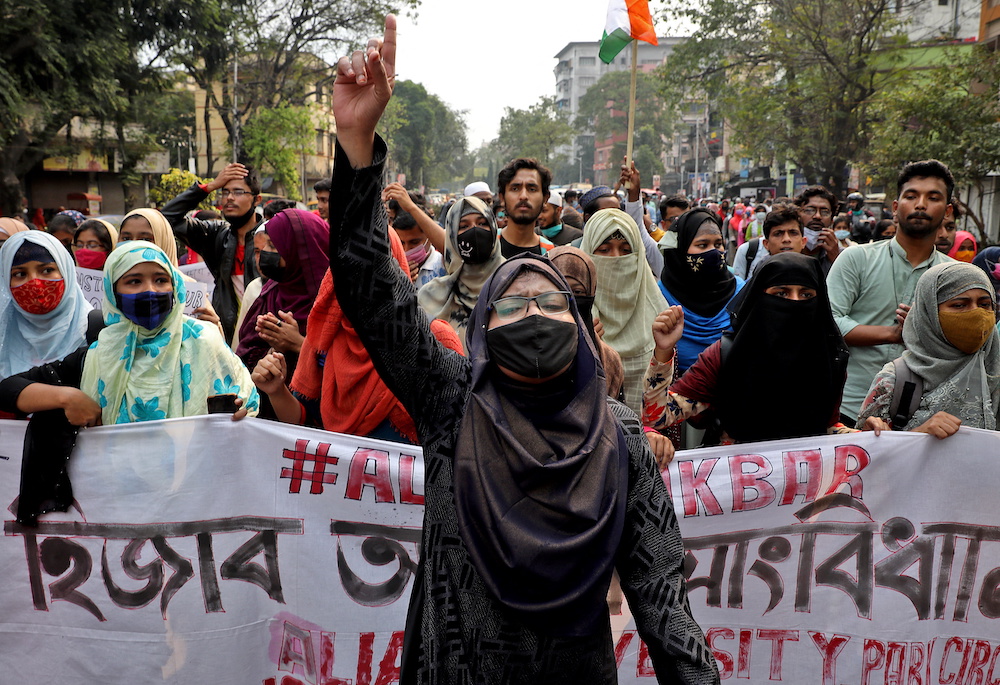 A Muslim student shouts slogans as she takes part in a protest against the recent hijab ban in few colleges of Karnataka state, in Kolkata, India, February 9, 2022. u00e2u20acu201d Reuters pic