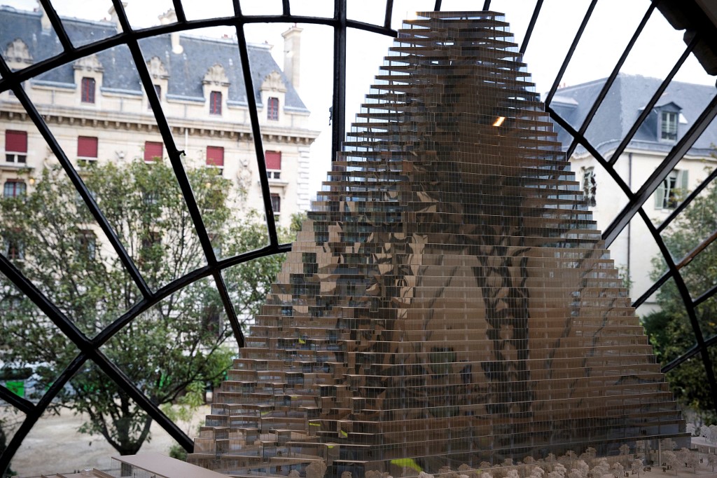 This file photo taken on November 3, 2014 shows a conceptual model (1/200 scale) of the future Tour Triangle at the Pavillon de l'Arsenal (the Paris Center for architecture and urbanism) in Paris. u00e2u20acu201d AFP picnn