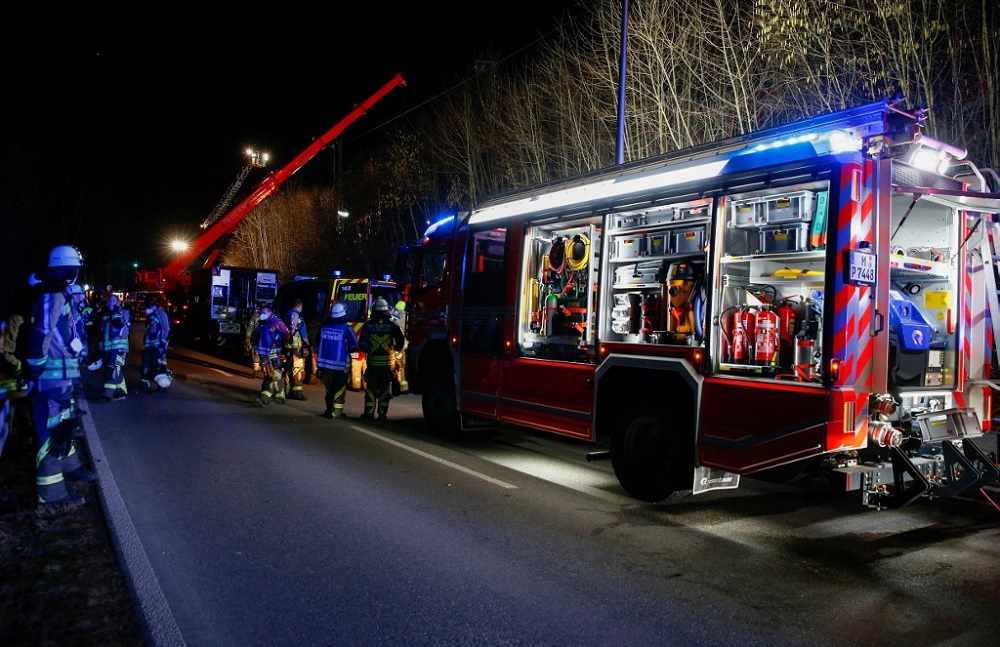 Members of the emergency services work at the scene of an S-bahn commuter train accident at Schaeftlarn in a district of Munich Februray 14, 2022. u00e2u20acu201d AFP pic