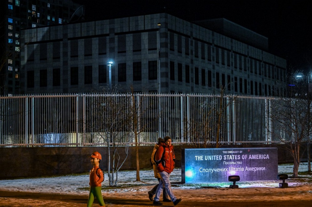 People pass by the closed US embassy in Kyiv after operations were moved to Lviv, on February 14, 2022. u00e2u20acu201d AFP pic