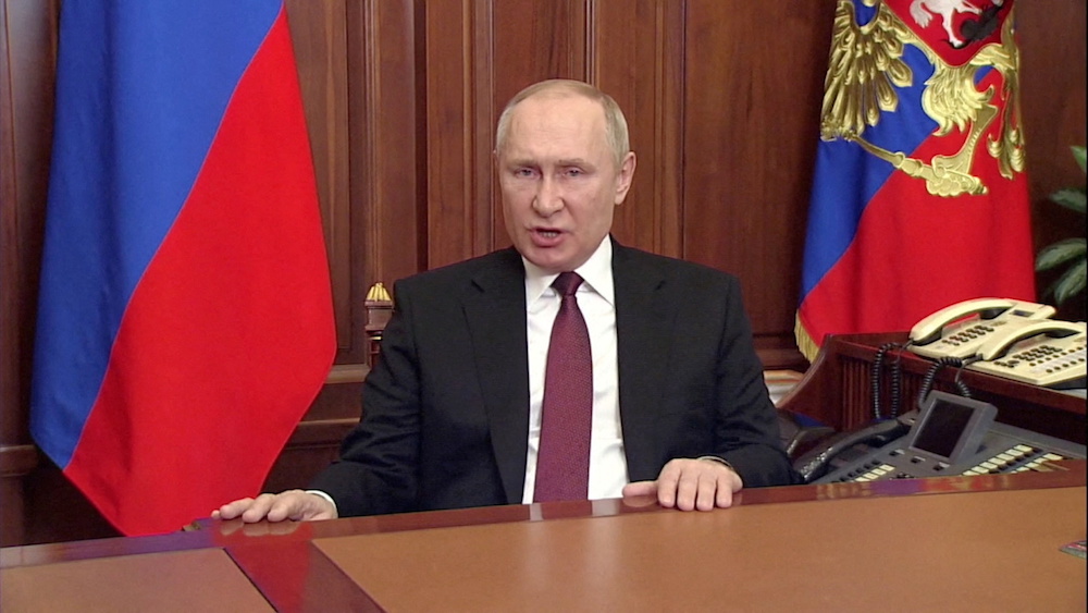 Russian President Vladimir Putin speaks about authorising a special military operation in Ukraine's Donbass region during a special televised address on Russian state TV, in Moscow February 24, 2022, in this still image. u00e2u20acu201d Russian Pool via Reuters