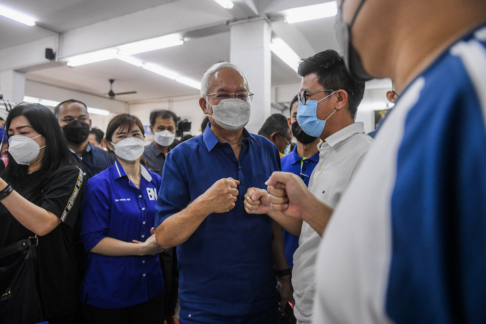 Former Prime Minister, Datuk Seri Najib Razak and N46 Perling MCA Candidates, Nicole Tan Huang Kee meet members of the public at Restoran Hock Lai, Taman Bukit Indah, Johor February 27, 2022. u00e2u20acu201d Picture by Ben Tan