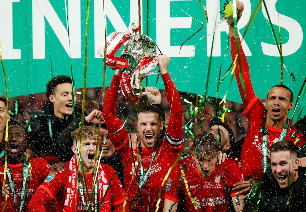 Liverpool's Jordan Henderson lifts the trophy as they celebrate winning the Carabao Cup, London February 28, 2022. u00e2u20acu201d Action Images via Reuters/John Sibley 