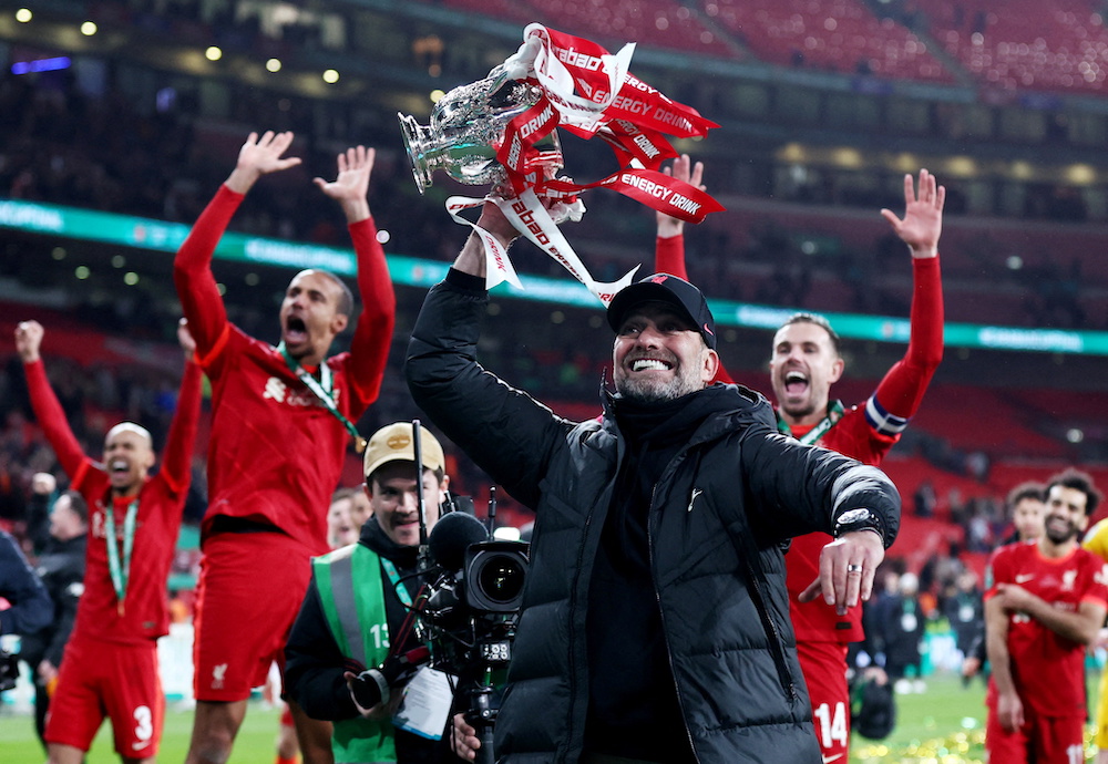 Liverpool manager Juergen Klopp celebrates with the trophy after winning the Carabao Cup, London February 28, 2022. u00e2u20acu201d Reuters pic 