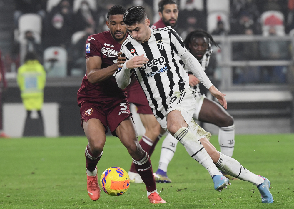 Juventus forward Alvaro Morata fights for the ball with Torino defender Bremer during the Italian Serie A match at Allianz stadium in Turin, February 18, 2022. u00e2u20acu2022 AFP picnn