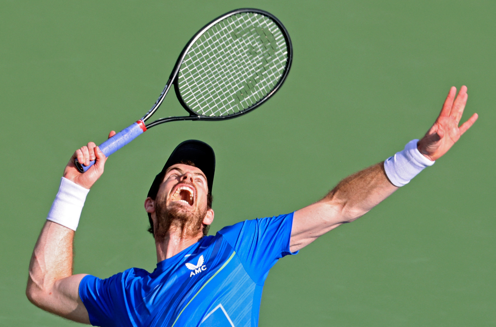 Andy Murray of Britain serves the ball to Jannik Sinner of Itali during their ATP Dubai Duty Free Tennis Championship round of 32 match in the Gulf emirate of Dubai, February 23, 2022. u00e2u20acu201d AFP pic 