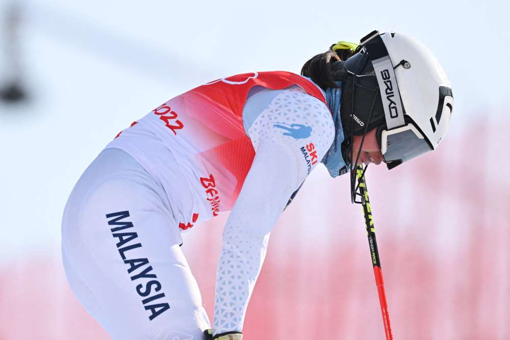 Malaysiau00e2u20acu2122s Aruwin Salehhuddin reacts after failing to finish the first run of the womenu00e2u20acu2122s slalom during the Beijing 2022 Winter Olympic Games at the Yanqing National Alpine Skiing Centre in Yanqing, February 9, 2022. u00e2u20acu2022 AFP picnn