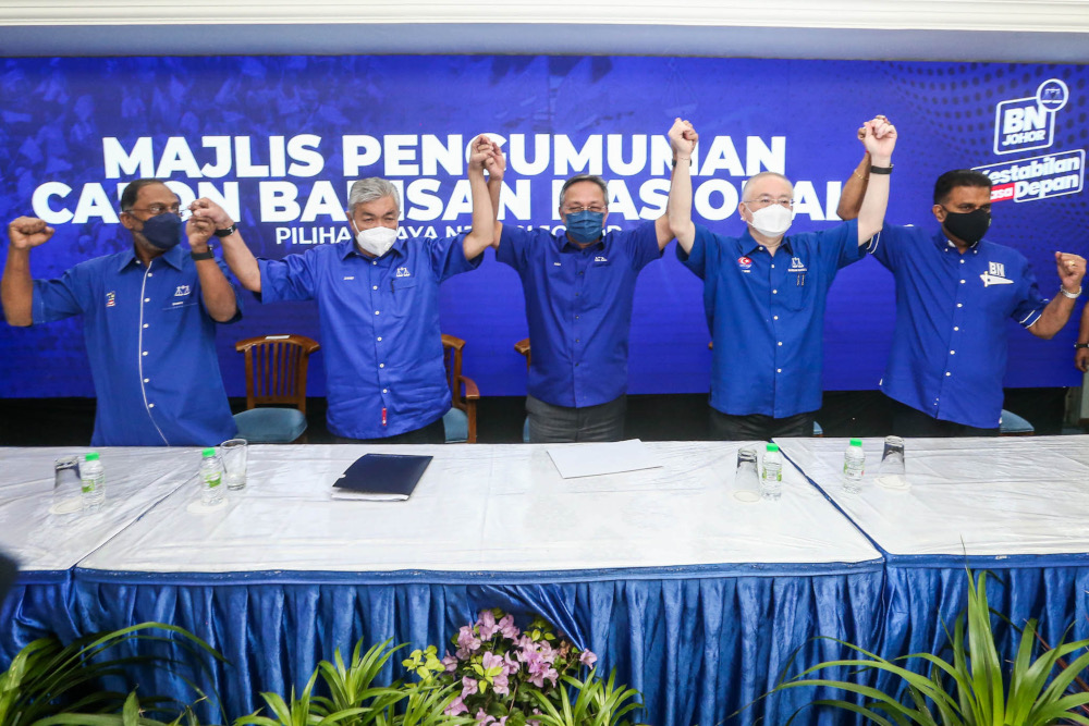 BN chairman Datuk Seri Ahmad Zahid Hamidi and other members during the BN candidate announcement at the Johor Umno Liaison Hall, February 24, 2022. u00e2u20acu201d Picture by Hari Anggara