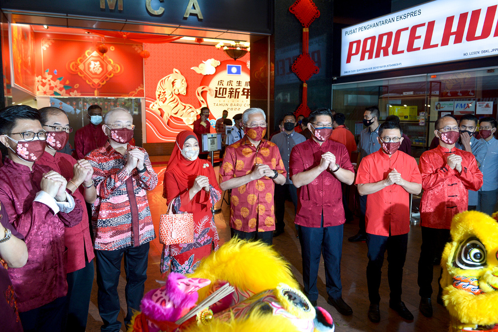 Prime Minister Datuk Seri Ismail Sabri Yaakob (centre) with MCA president Datuk Seri Wee Ka Siong at the MCA Chinese New Year celebration at Wisma MCA, Kuala Lumpur, February 1, 2022. u00e2u20acu201d Picture by Miera Zulyana