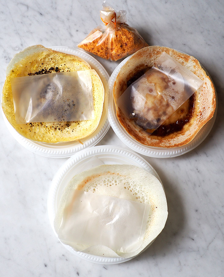 The 'appams' are kept intact despite the journey home with their packaging