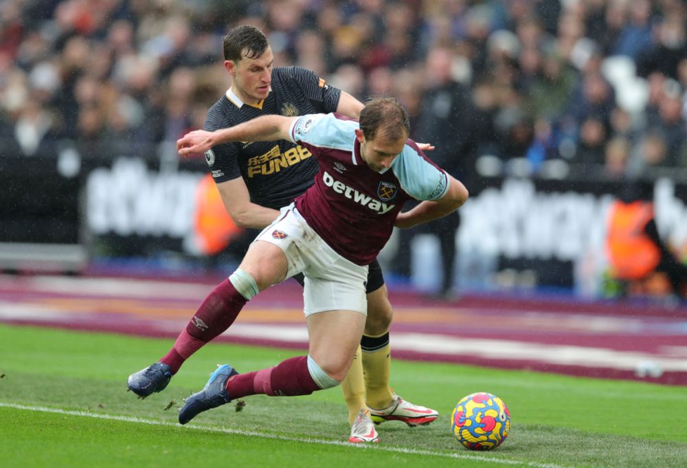 West Ham Unitedu00e2u20acu2122s Craig Dawson in action with Newcastle Unitedu00e2u20acu2122s Chris Wood during their Premier League match at London Stadium, London, February 19, 2022. u00e2u20acu201d Reuters pic